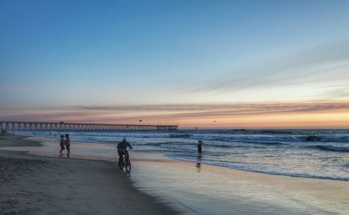 Scenic view of sea at sunset
