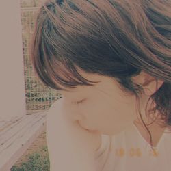 Close-up portrait of a girl at home