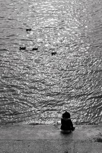 Reflection of woman in water