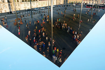 High angle view of people on street in city