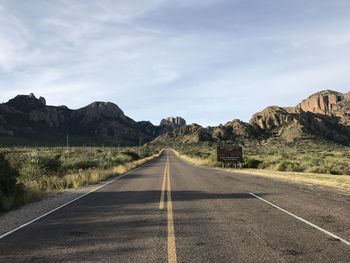 Empty road against sky