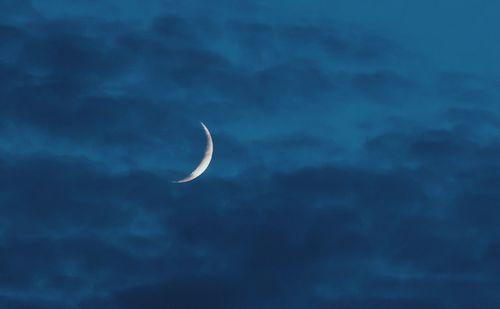 Low angle view of moon in sky