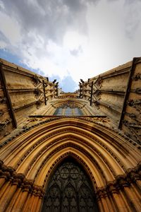 Low angle view of ornate building against sky