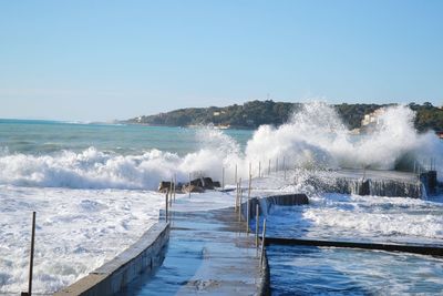 Panoramic shot of sea against clear sky