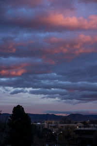 Dramatic sky over city at night