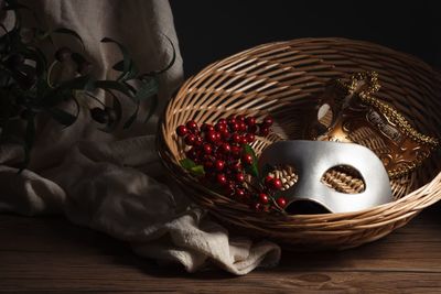 Close-up of fruits in basket on table