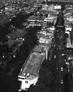 High angle view of street amidst buildings in city