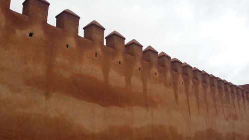 Low angle view of built structure against sky