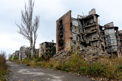 Buildings in city against sky