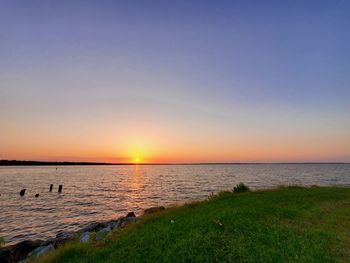 Scenic view of sea against sky during sunset