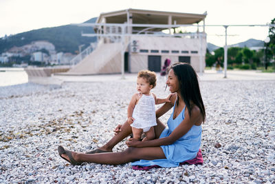 Women sitting on beach