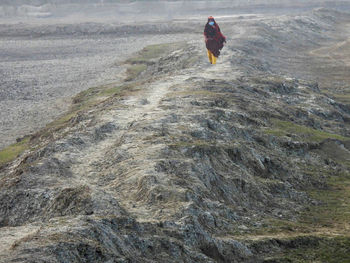 Woman walking on land