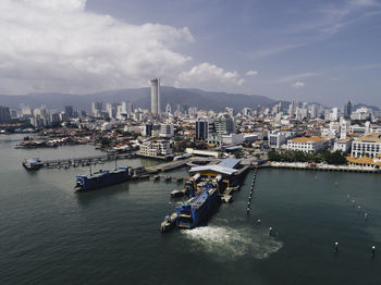 Harbor against buildings in city