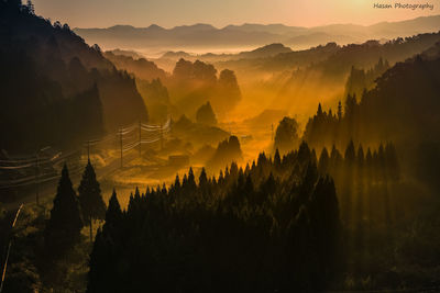 Panoramic view of landscape against sky during sunset