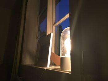 Low angle view of illuminated window