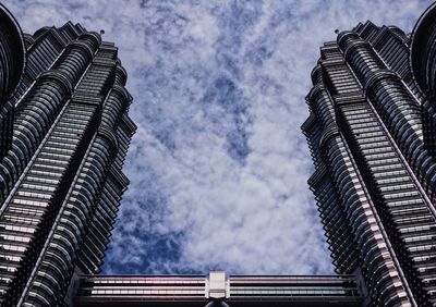 Low angle view of skyscrapers against sky
