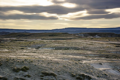 Scenic view of landscape against sky during sunset