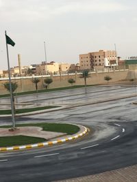 View of road along buildings