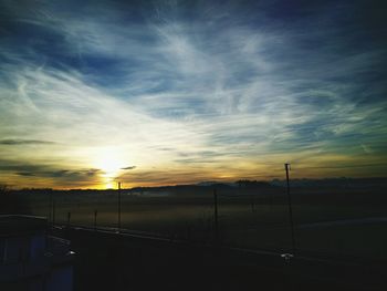 Sun shining through clouds