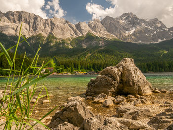 Scenic view of rocks in mountains against sky