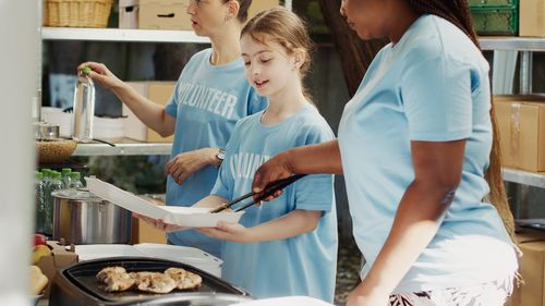 Midsection of woman preparing food