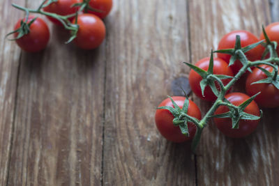 High angle view of red berries on table