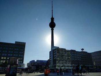 Low angle view of communications tower against clear sky