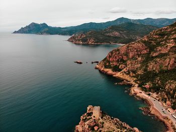 High angle view of bay and sea against sky