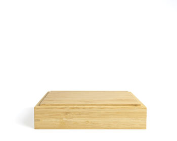Close-up of wooden planks over white background