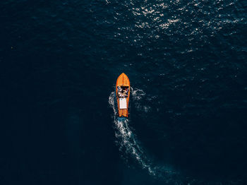 High angle view of people on sea