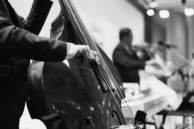 Side view of people sitting in car