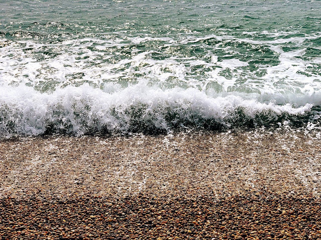 WAVES SPLASHING ON SHORE