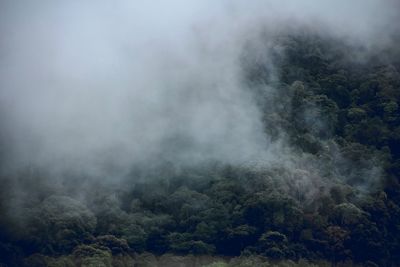 Smoke emitting from volcanic mountain