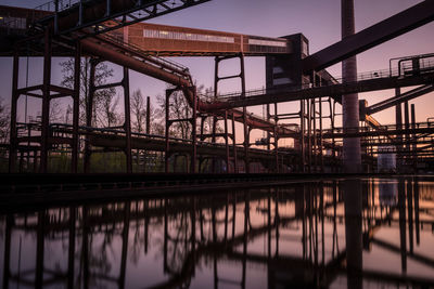 Bridge over river against sky