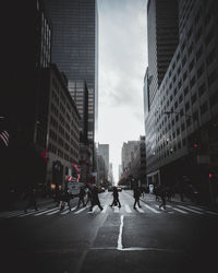 People on street in city