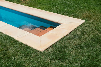 High angle view of swimming pool in field