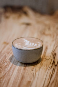 Close-up of coffee cup on table