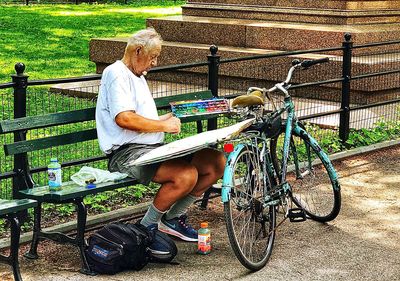 Man sitting on bicycle