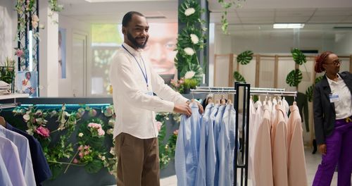 Side view of woman standing in store