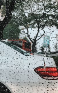 Raindrops on glass window during rainy season