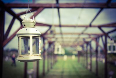 Close-up of lantern hanging from ceiling