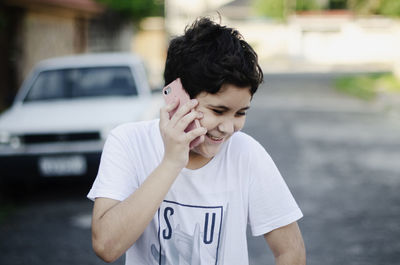 Portrait of teenage boy looking at camera