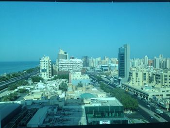 Cityscape against blue sky