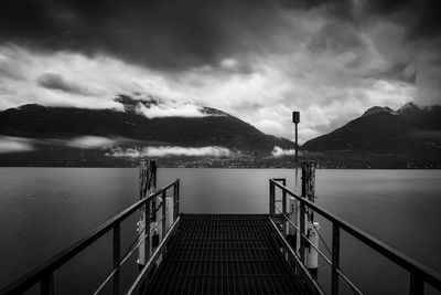 Pier over sea against sky