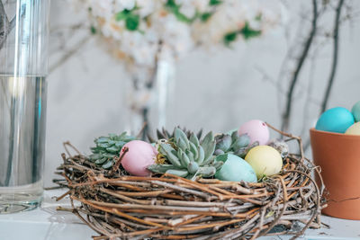 Close-up of eggs in basket on table