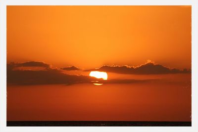 Scenic view of sunset over river