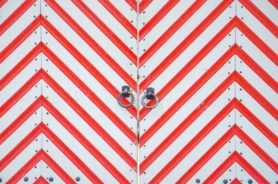 Full frame shot of red and white patterned door
