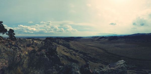 Panoramic view of landscape and sea against sky