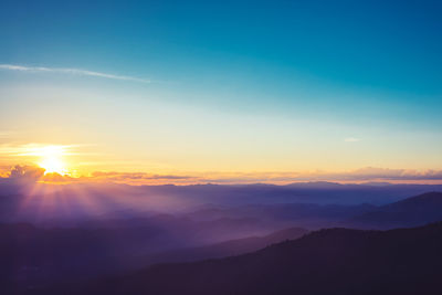 Scenic view of landscape against sky during sunset