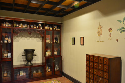 View of books on shelf at home